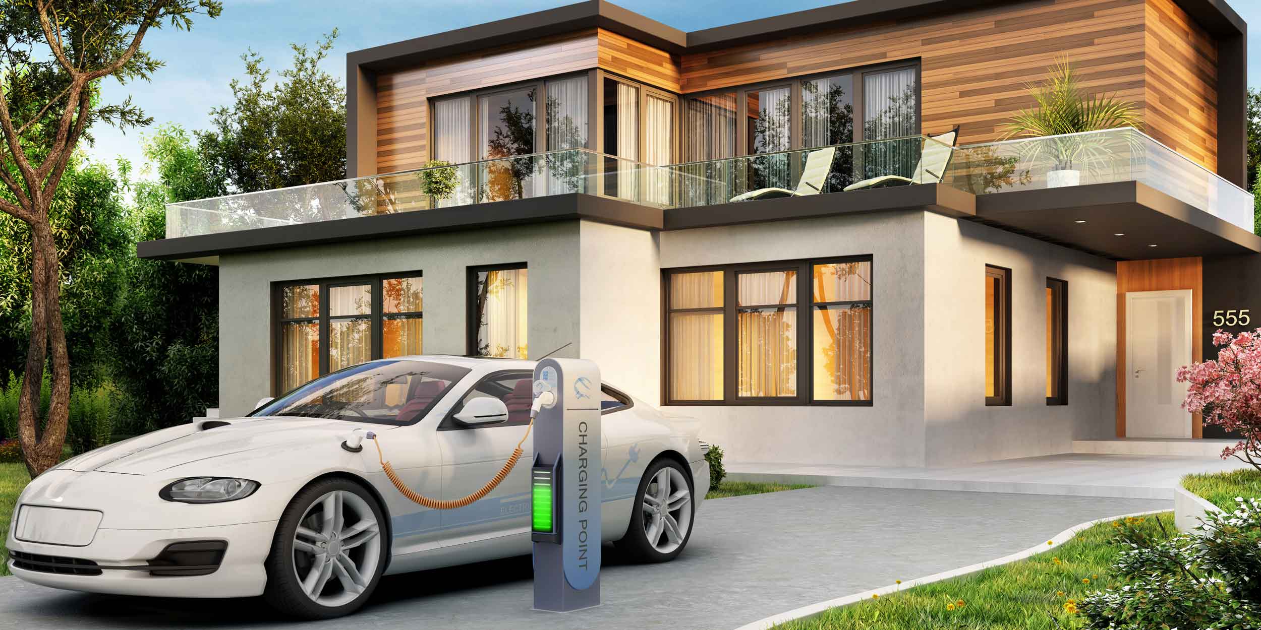 Modern home with a car charging in the driveway